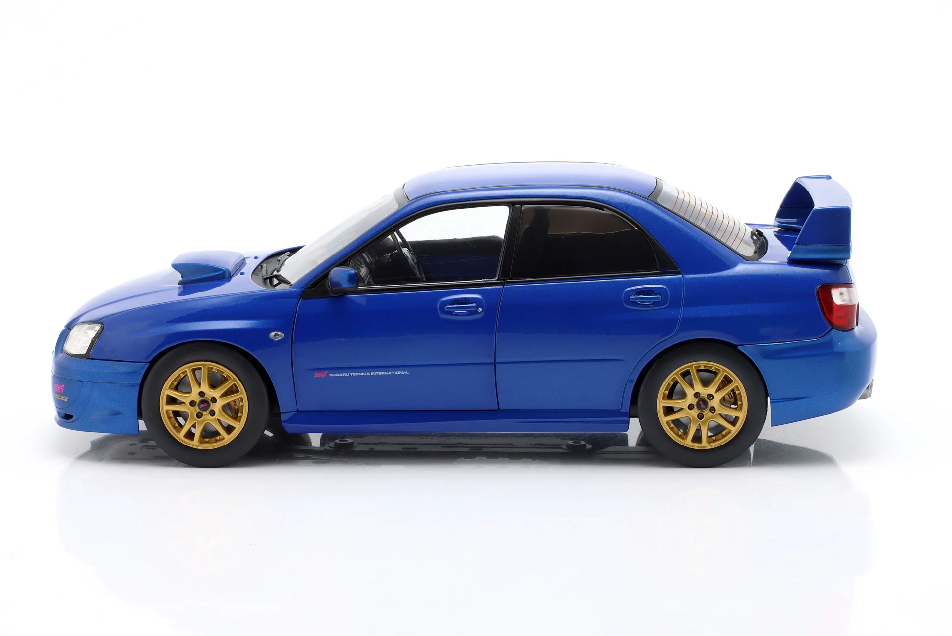 Miniature Solido 1/18 - Subaru Impreza WRX STI 2003 - Bleu Sonic - NEUVE
