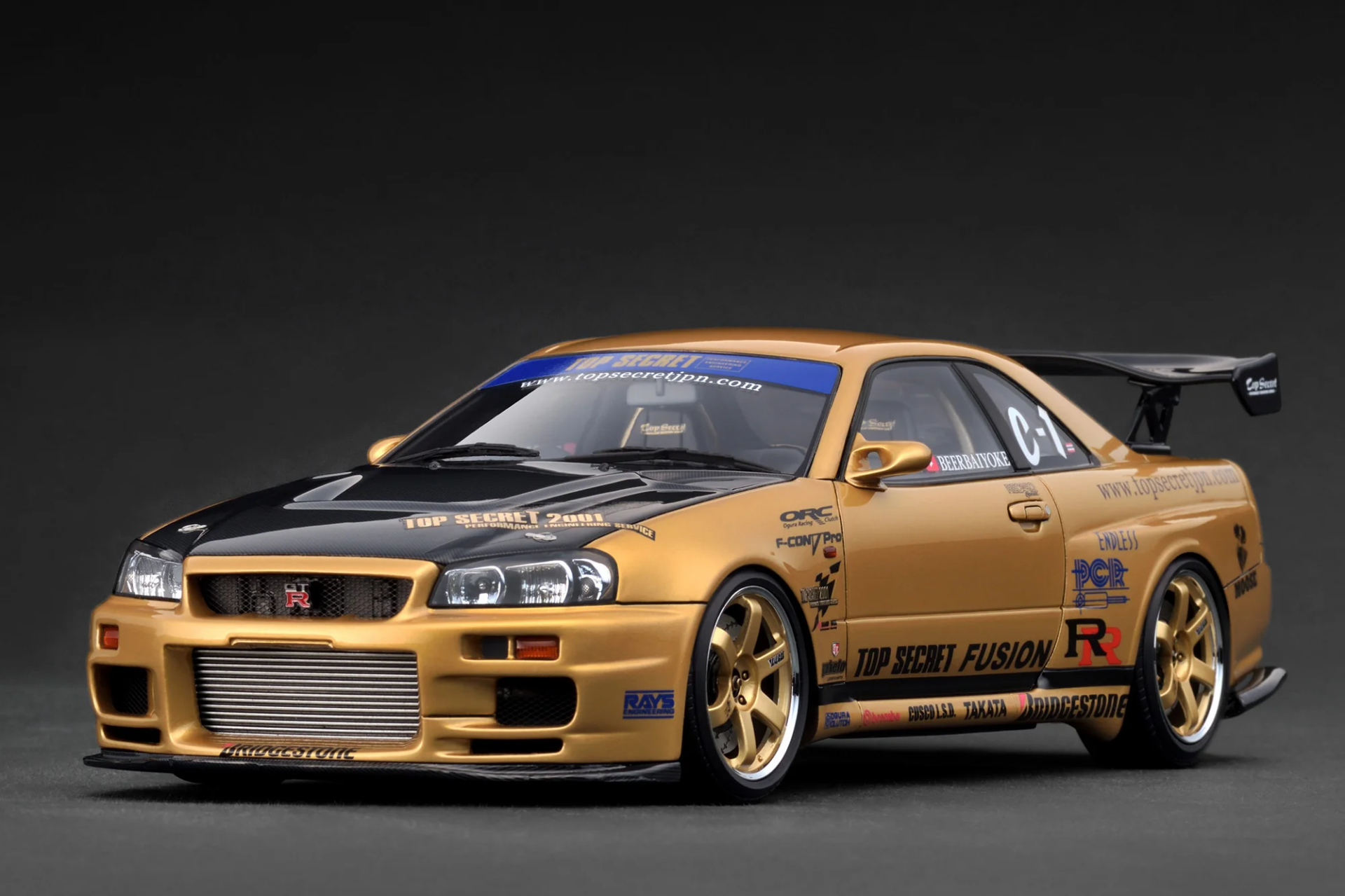 1/18 Ignition Nissan Skyline R34 TOP SECRET 34GT-R (BNR34) Gold - IG3847
