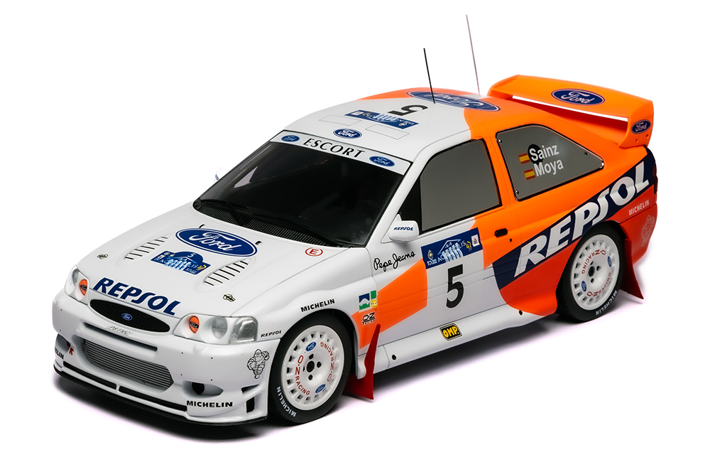 1/18 IXO-MODELS - FORD ENGLAND - ESCORT WRC TEAM REPSOL FORD MOTOR COMPANY N 4 WINNER RALLY ACROPOLIS 1997 CARLOS SAINZ - LUIS MOYA