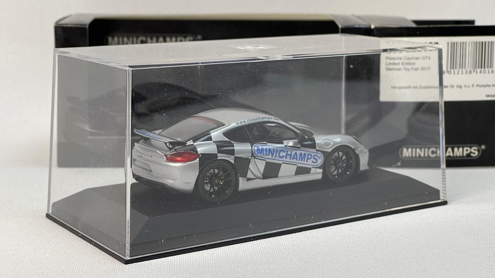 MINICHAMPS 1/43 Porsche Cayman GT4 – Édition German Toy Fair – Argenté