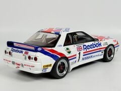 AUTOART - NISSAN - SKYLINE GT-R (R32) TEAM REEBOK N 1 GROUP A 1990 HASEMI - WITH DRIVER FIGURE