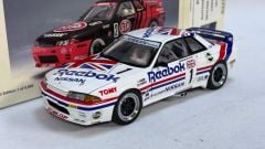 AUTOART - NISSAN - SKYLINE GT-R (R32) TEAM REEBOK N 1 GROUP A 1990 HASEMI - WITH DRIVER FIGURE